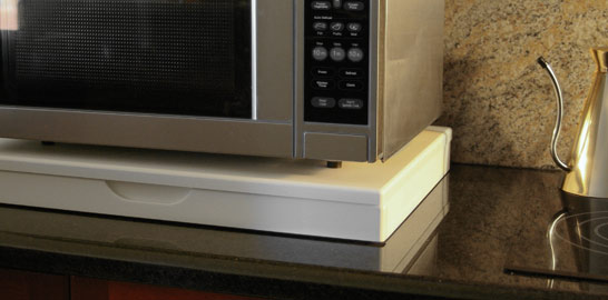 a microwave shelf, a closed 598mm Microwave Stealth Shelf in antique white, short