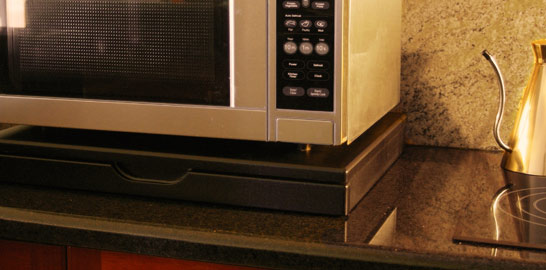 a microwave shelf, a closed 598mm Microwave Stealth Shelf in antique white, short