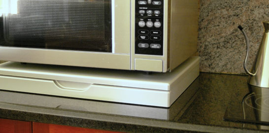 a microwave shelf, a closed 598mm Microwave Stealth Shelf in antique white, short