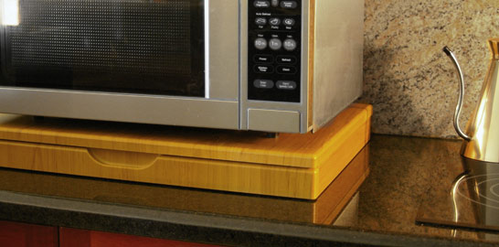 a microwave shelf, a closed 598mm Microwave Stealth Shelf in antique white, short